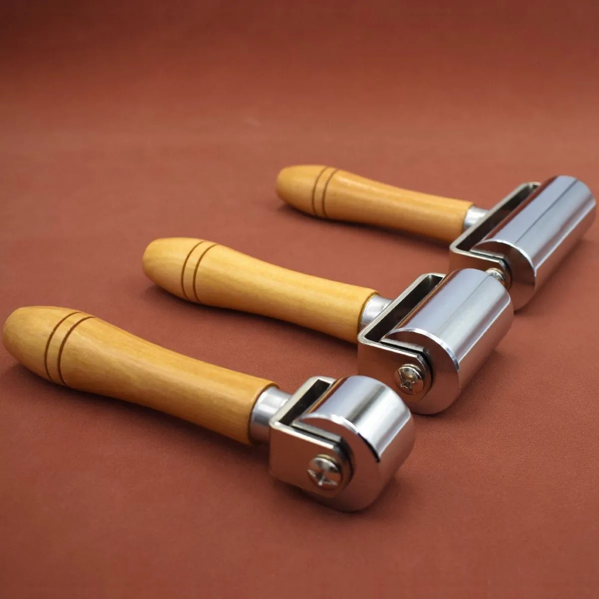 imgi_21_2c455412-3151-426f-aefb-28509264dc63 Leather Rolling Wheel - Solid Wood Handle Edge Pressing Tool - Image 1